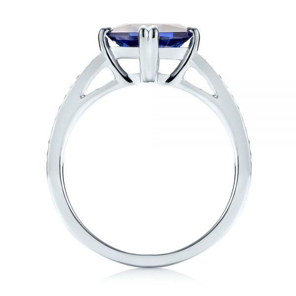 Vivid Tanzanite Halo Ring with Gemstone Accents