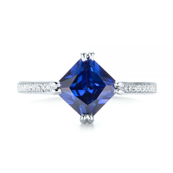 Vivid Tanzanite Halo Ring with Gemstone Accents